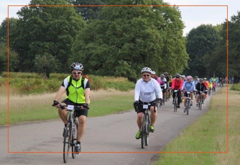 people riding bicycles in training for charity ride