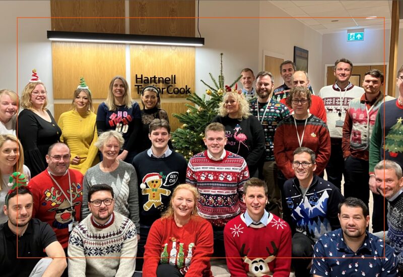 Hartnelll Taylor Cook celebrate Christmas Jumper Day